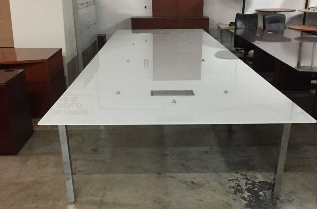 Conference Table 19’x6’, white glass top with two power modules  on chrome base