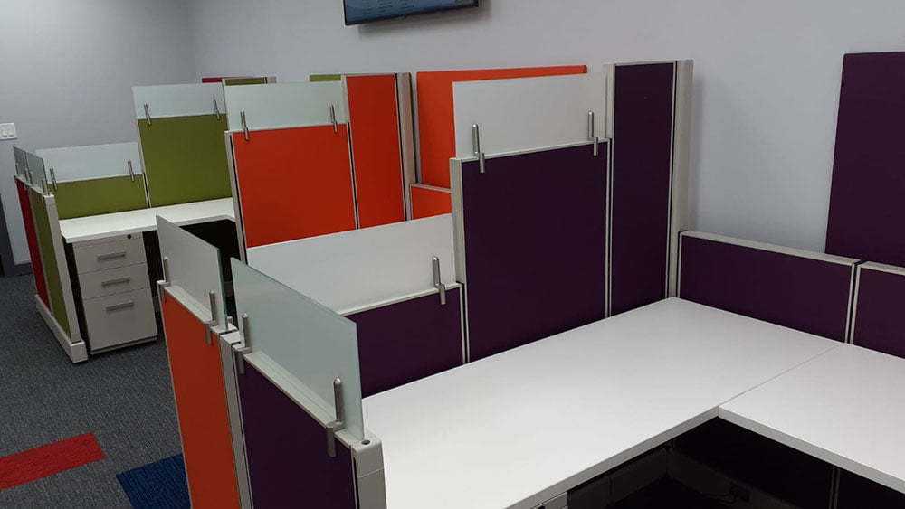 Multicolored office furniture cubicle installation